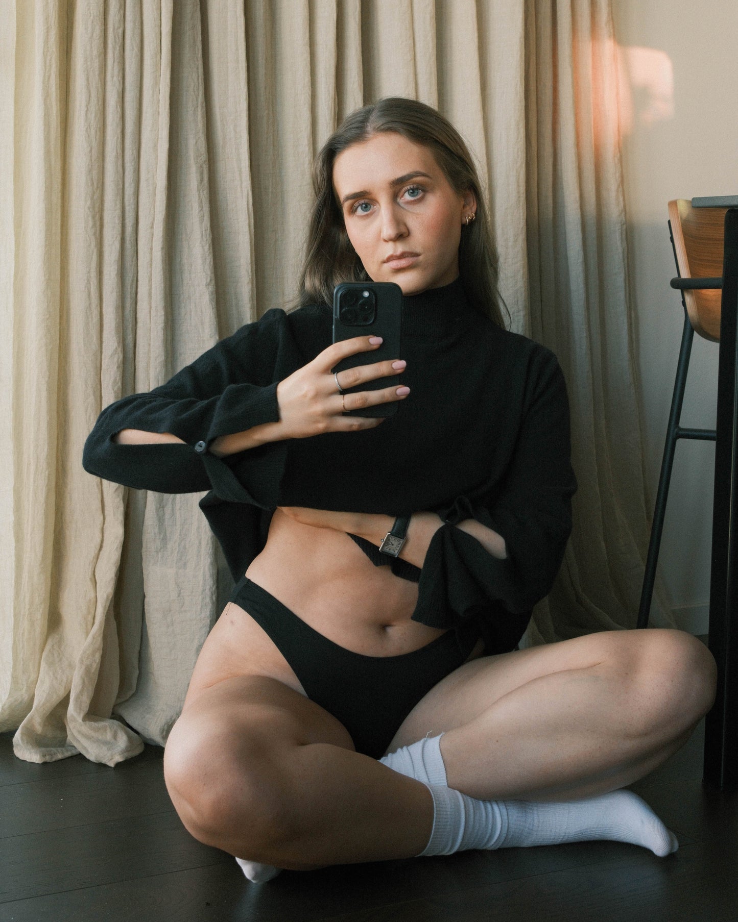 Model sitting in eco friendly high cut pantie tencel lyocell