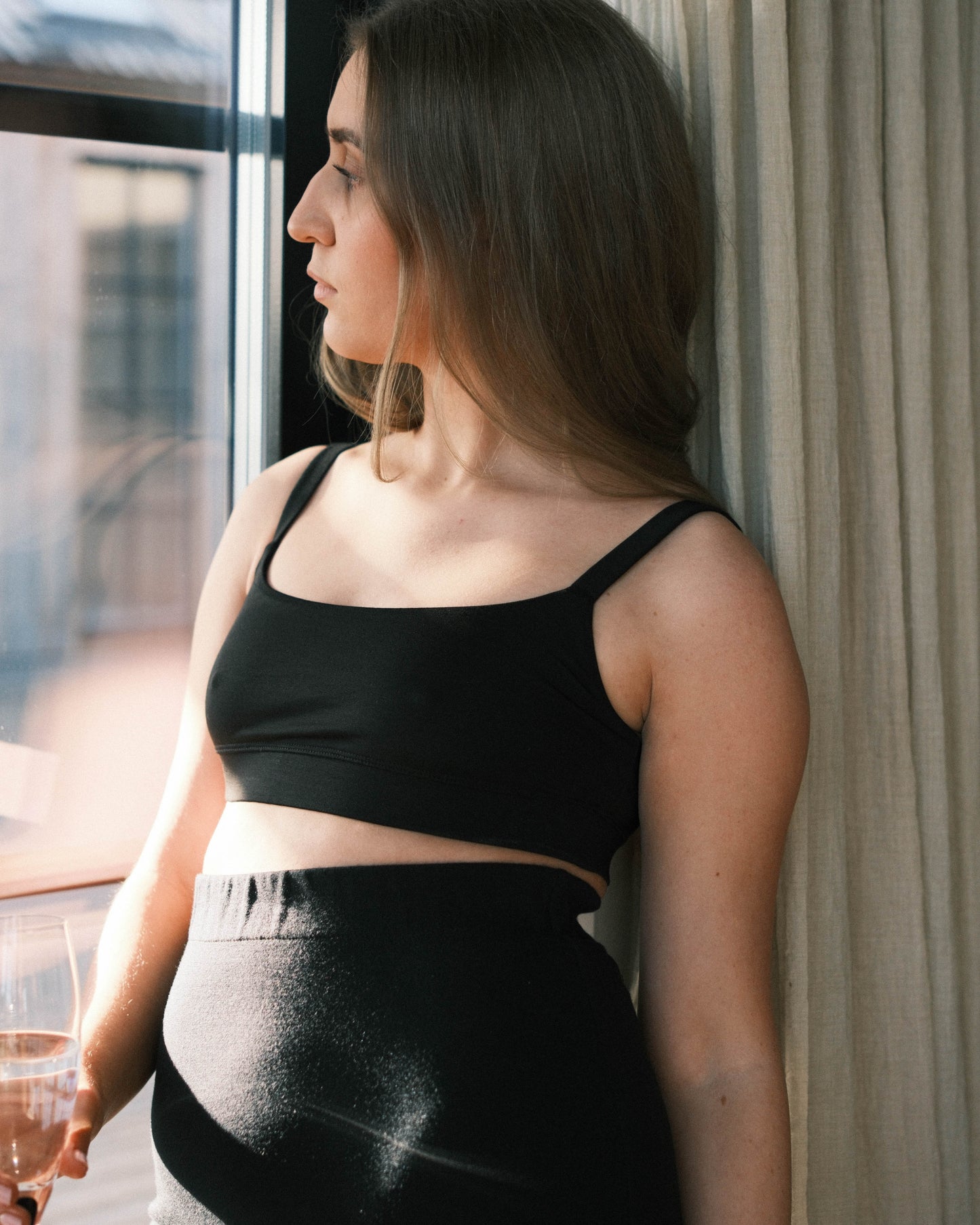 Model in light support bralette in sustainable tencel lyocell