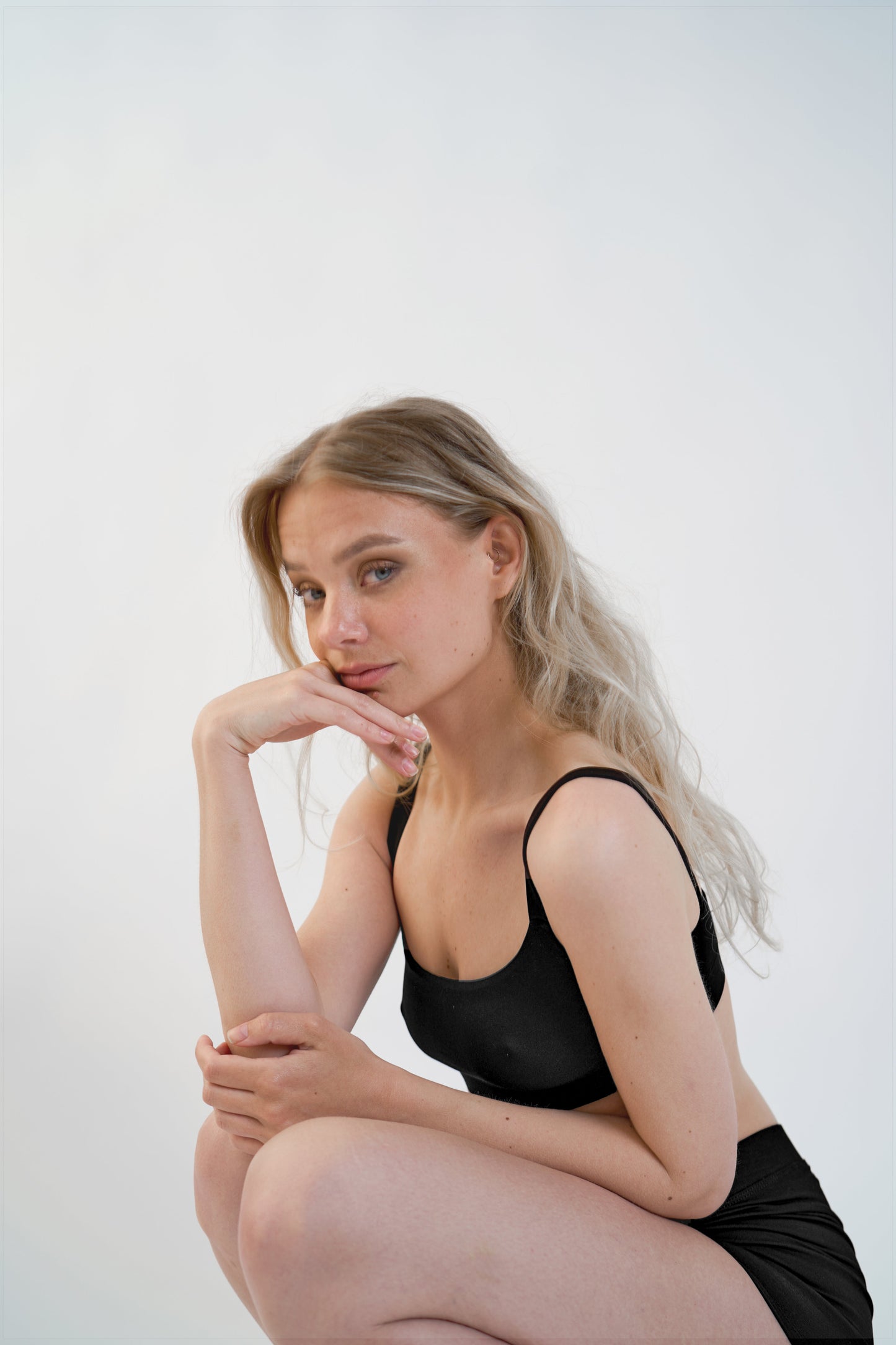 Sustainable Tencel™ lingerie bralette and shorts, side view on model
