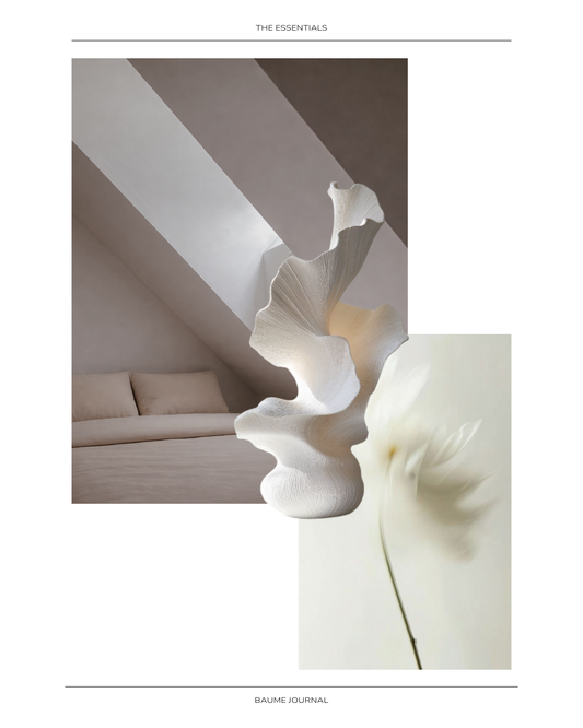 Minimal editorial collage featuring a soft, neutral-toned interior with architectural light and shadows, layered with flowing sculptural forms and a delicate flower, evoking calm, texture, and sensory design