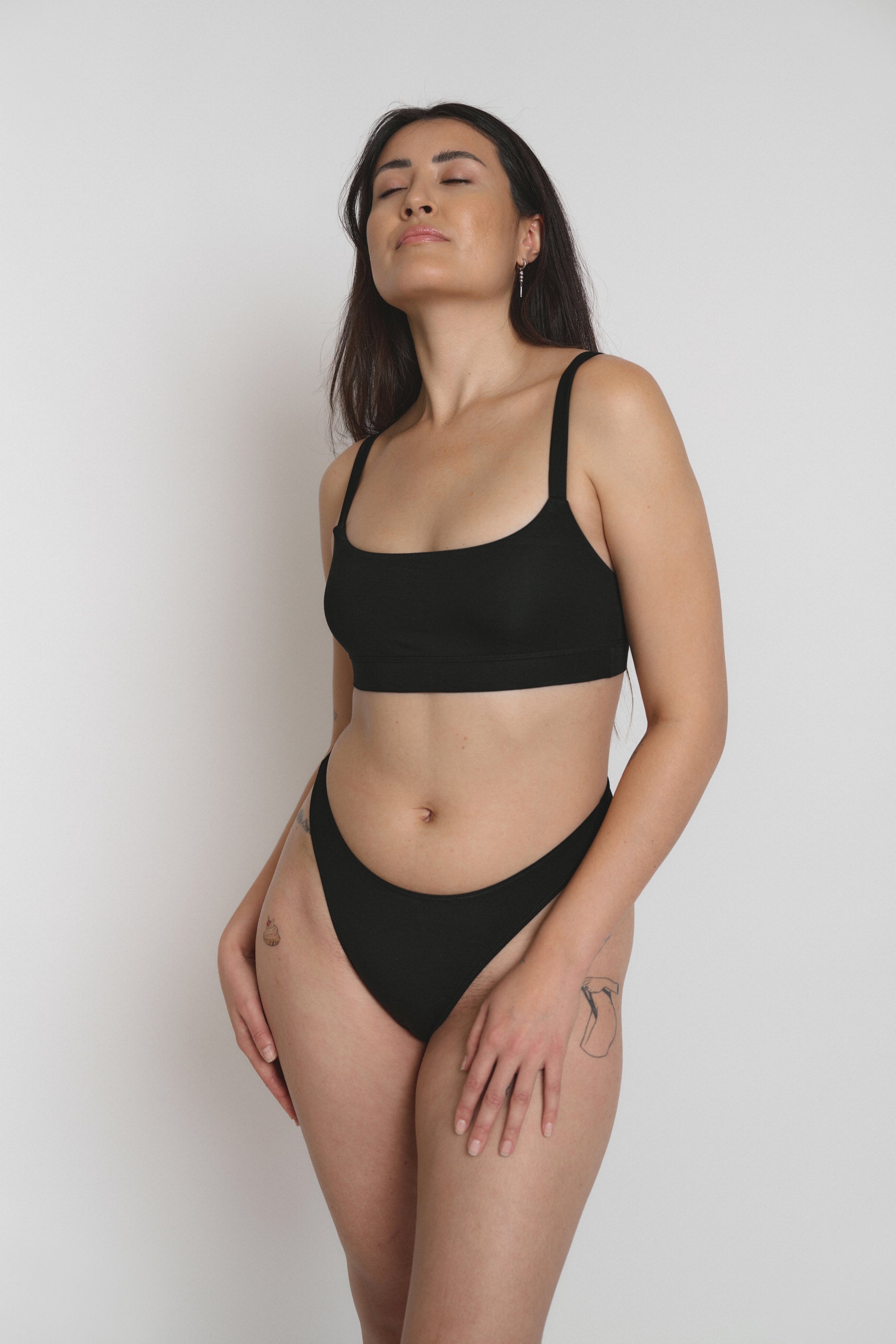 Model wearing comfortable eco-friendly bralette, front view