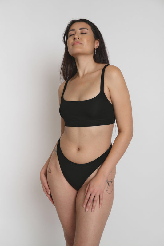 Model wearing high-cut eco-friendly underwear, front view