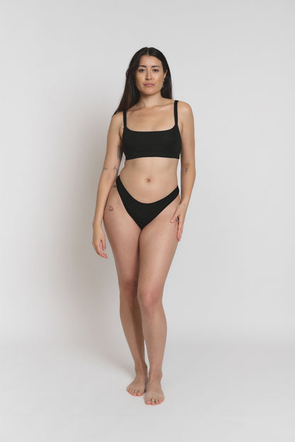 Model wearing high-cut Tencel™ Lyocell thong, front view