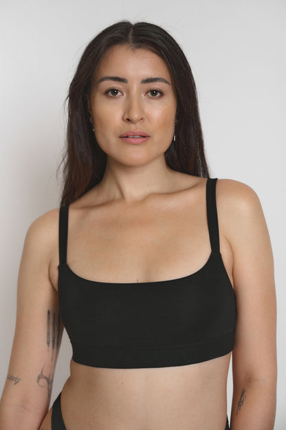 Model wearing light support Tencel™ Lyocell bralette, front view