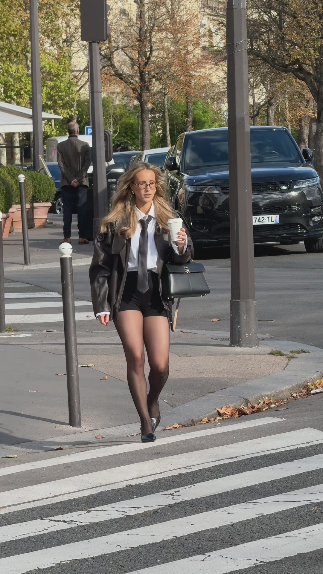 Baume Essentials everyday shorts showcased as part of an everyday outfit on the streets