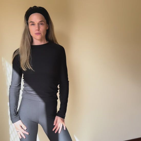 BAUME founder Denise working out in Form // Tights and Form // Long Sleeve Top made with TENCEL™ Lyocell and OEKO-TEX® STANDARD 100 certified materials