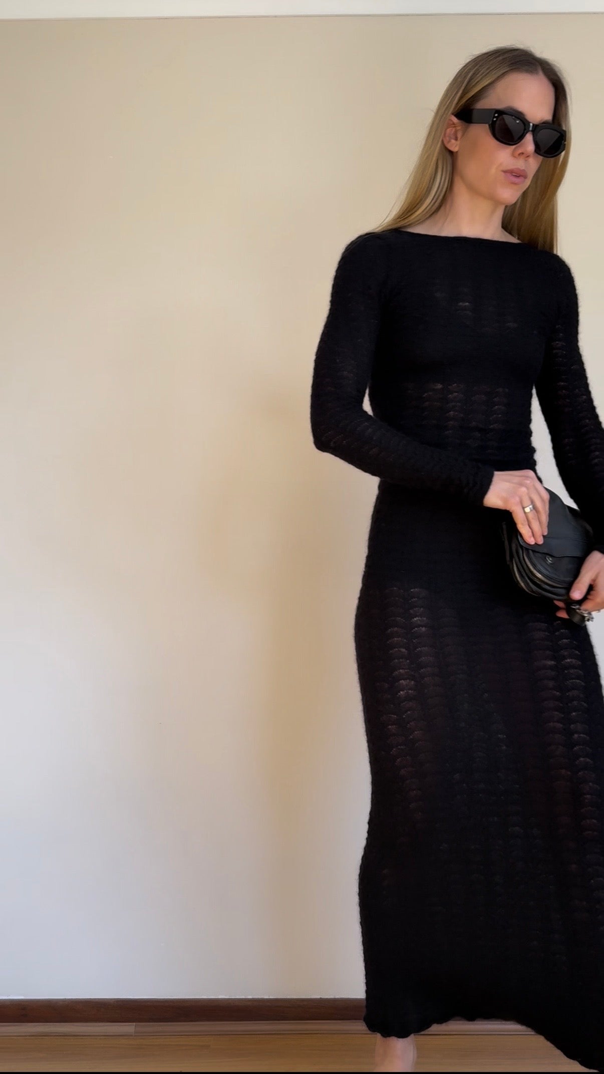 Co-founder Denise showcasing how to transform the versatile Deep V Bralette and Shorts from Baume Essentials to everyday statement pieces under a transparent dress. 